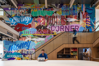 Office with colourful mural on back wall